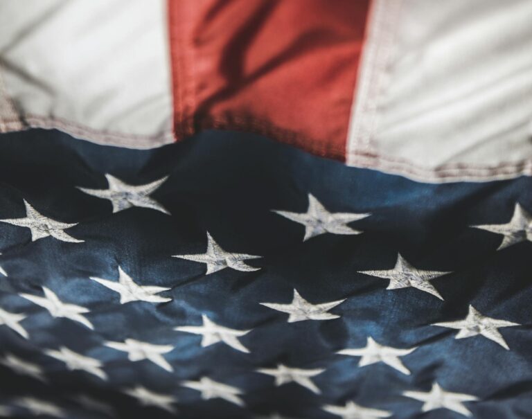 Detailed view of the American flag showcasing vibrant stars and stripes symbolizing patriotism.