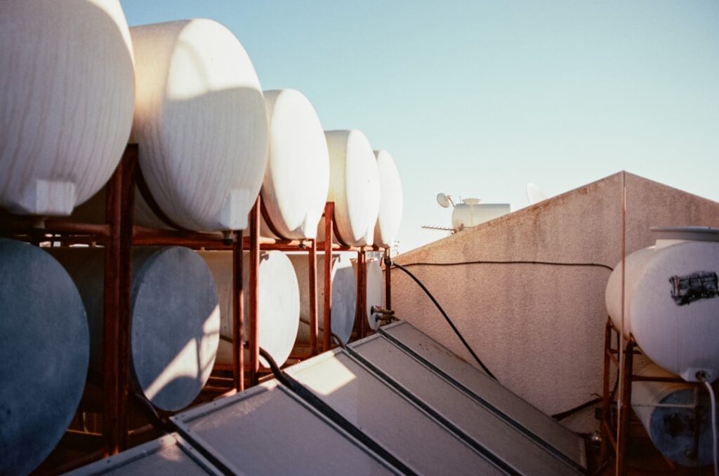 Commercial water heaters in a modern facility mechanical room