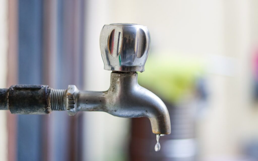 leaky faucet dripping water