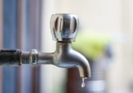 leaky faucet dripping water
